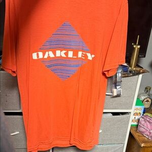 Oakley Vibrant Orange Tee with Blue Graphic